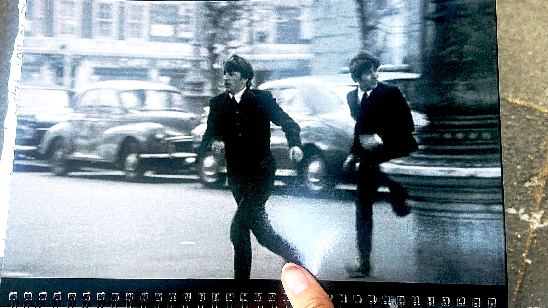 Listen to your guide on the Beatles walking tour as he recounts how one of the scenes from A Hard Day's Night was filmed in Marylebone. Image courtesy of Carole Rocton. Photograph of one of the scenes from the film A Hard Day's Night, showing two members of the Beatles running through the streets of Marylebone near Boston Place.