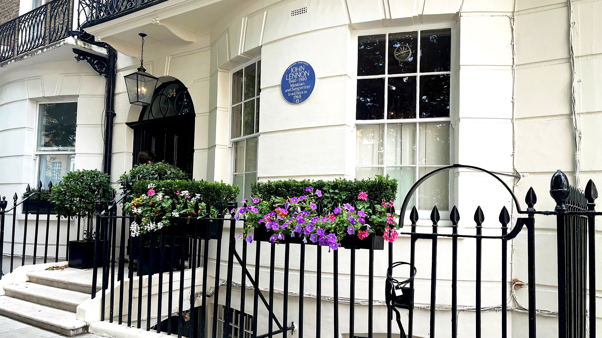 Take the Marylebone Beatles walking tour to see where the Beatles lived in London. Image courtesy of Carole Rocton. White terrace flat on Wimpole Street, where there is a blue plaque stating that John Lennon lived there.
