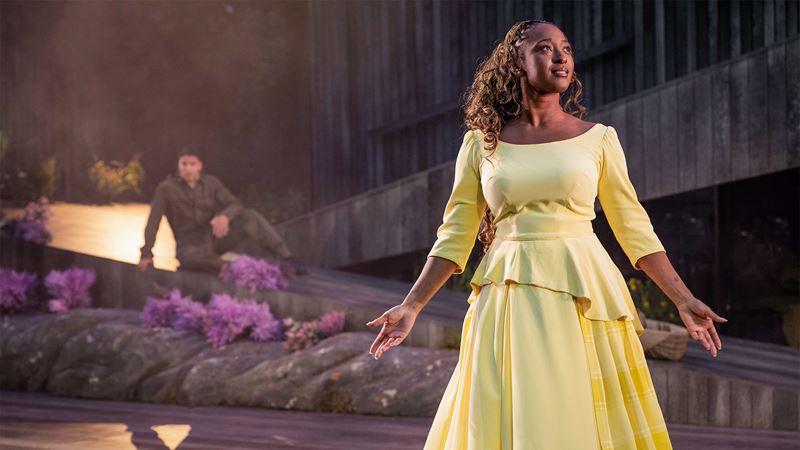 Fiona performs a solo against the heather-clad stage in Brigadoon