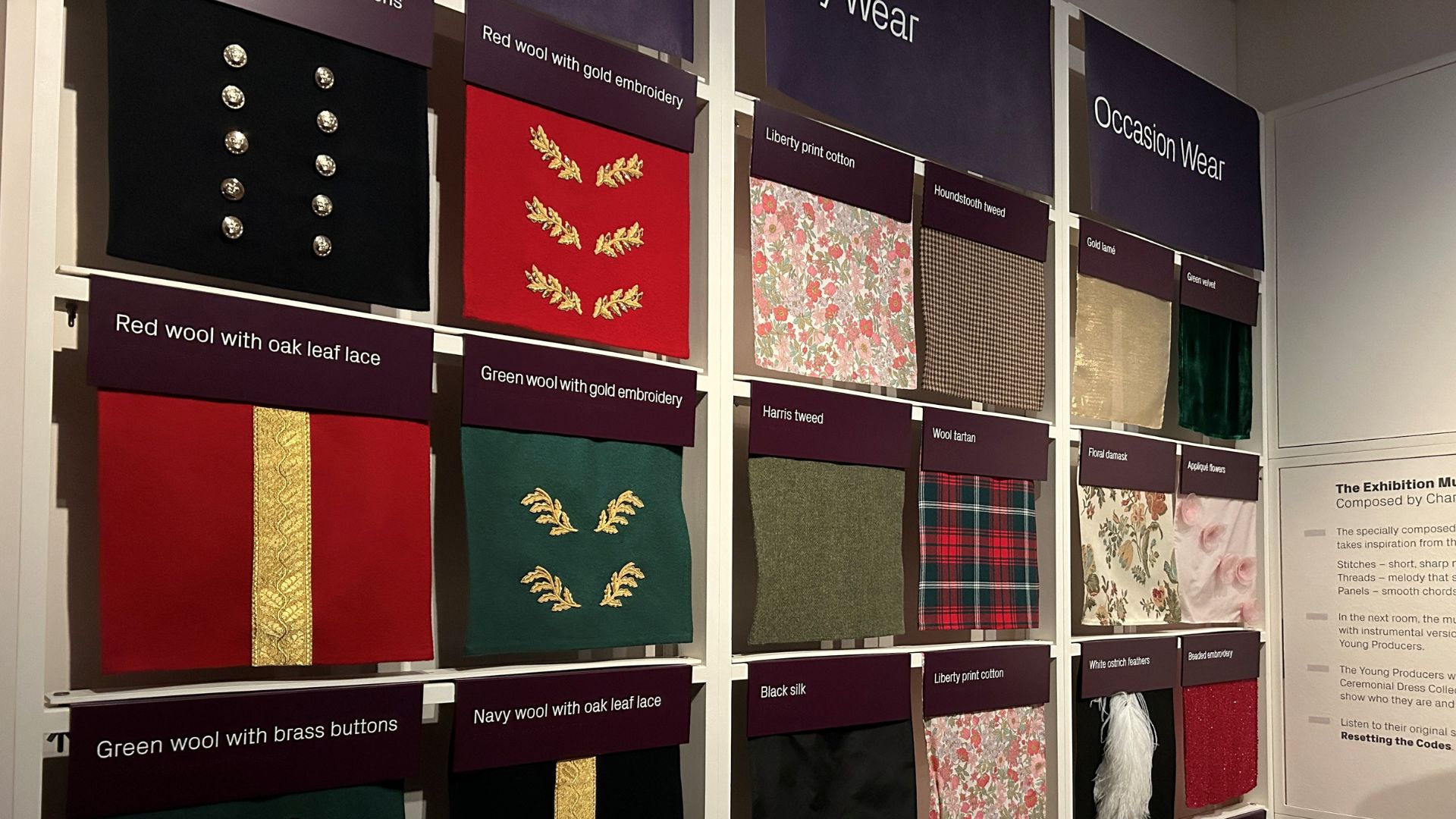 Explore the materials and embellishments used to make royal clothing at the Dress Codes exhibition. © Visit London/Charlotte Pritchard. Materials and embellishments hanging on wall at Dress Codes exhibition.