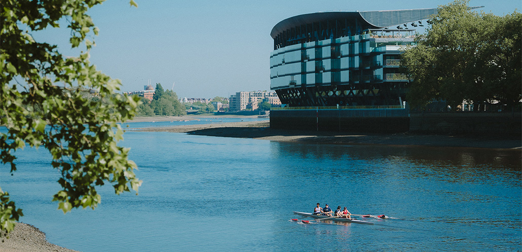 Enjoy riverside relaxation at Fulham Pier. Image courtesy of Fulham Pier. Rowers sail past Fulham Pier on a sunny day