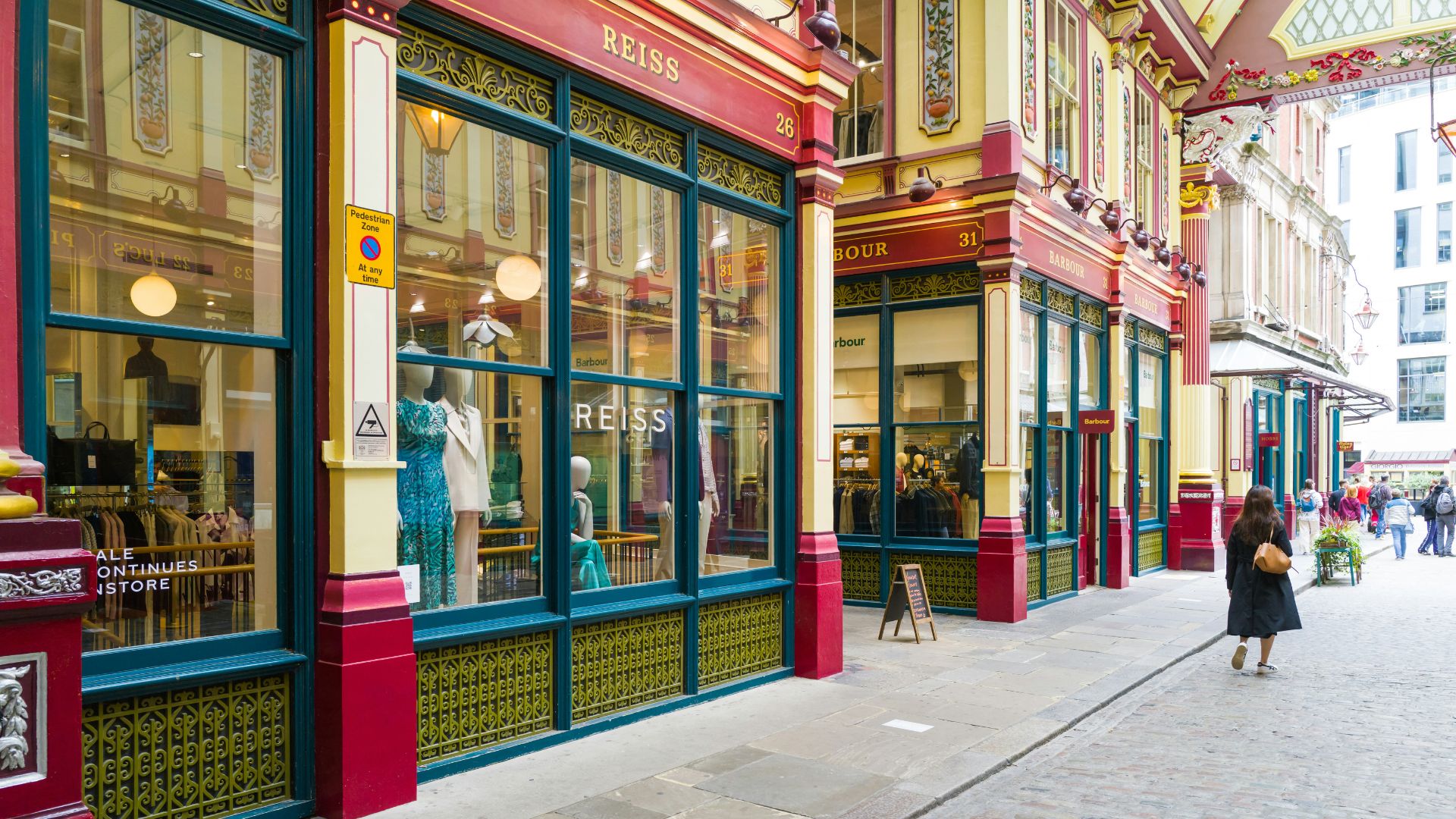 Discover a treasure trove of stylish boutiques at Leadenhall Market. Image courtesy of Unsplash. Shopfront of Reiss women's clothing store at Leadenhall Market.