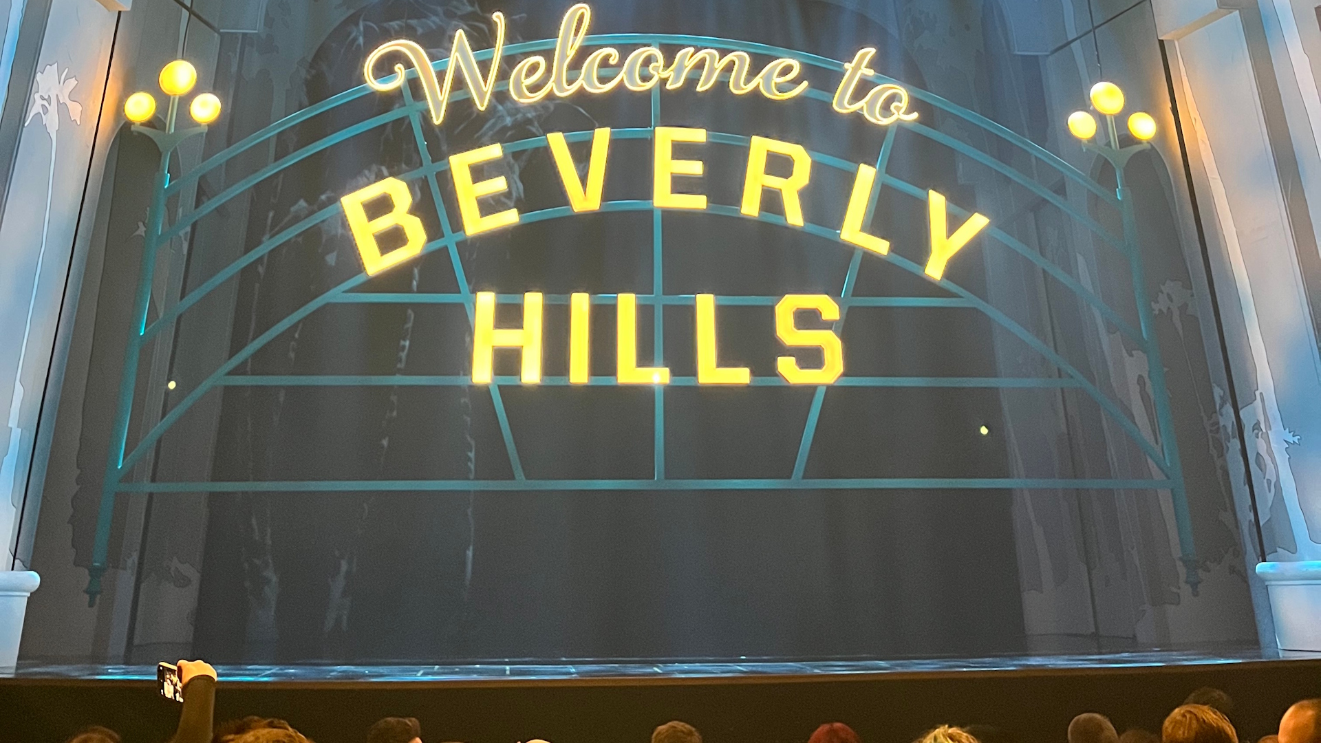 Follow the queen bee of Beverly Hills High in new musical Clueless © Visit London/Georgie Groom-Rietschy. The stage curtain at the start of Clueless the musical, which has the wording "Welcome to Beverly Hills" in yellow lights.