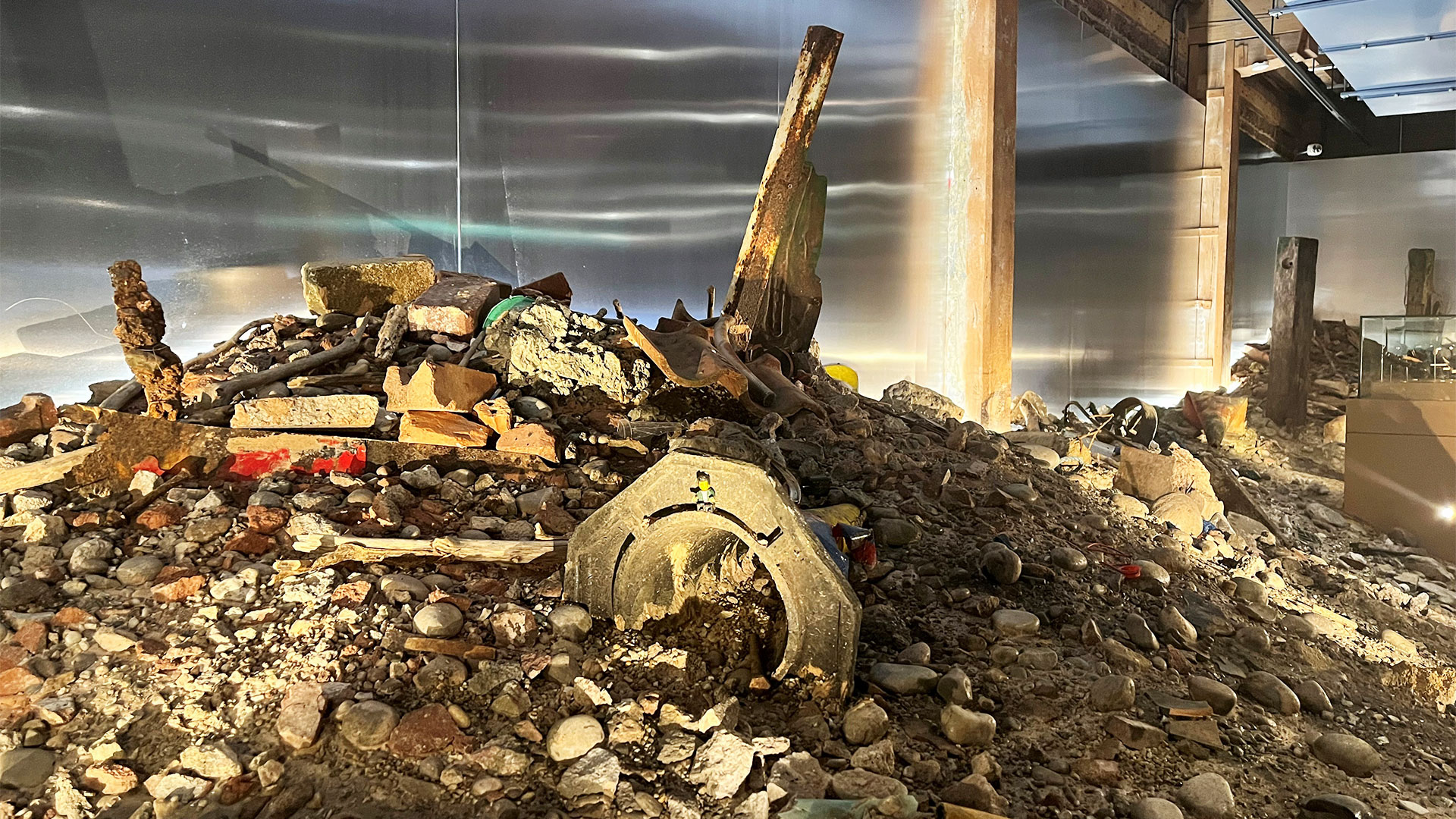 Explore London Museum Dockland's latest exhibition and enter the world of mudlarking and treasure hunting. Image courtesy of Carole Rocton At London's Museum Docklands, a mountain of gravel, bricks and metal objects are piled up to recreate the muddy banks of the Thames.
