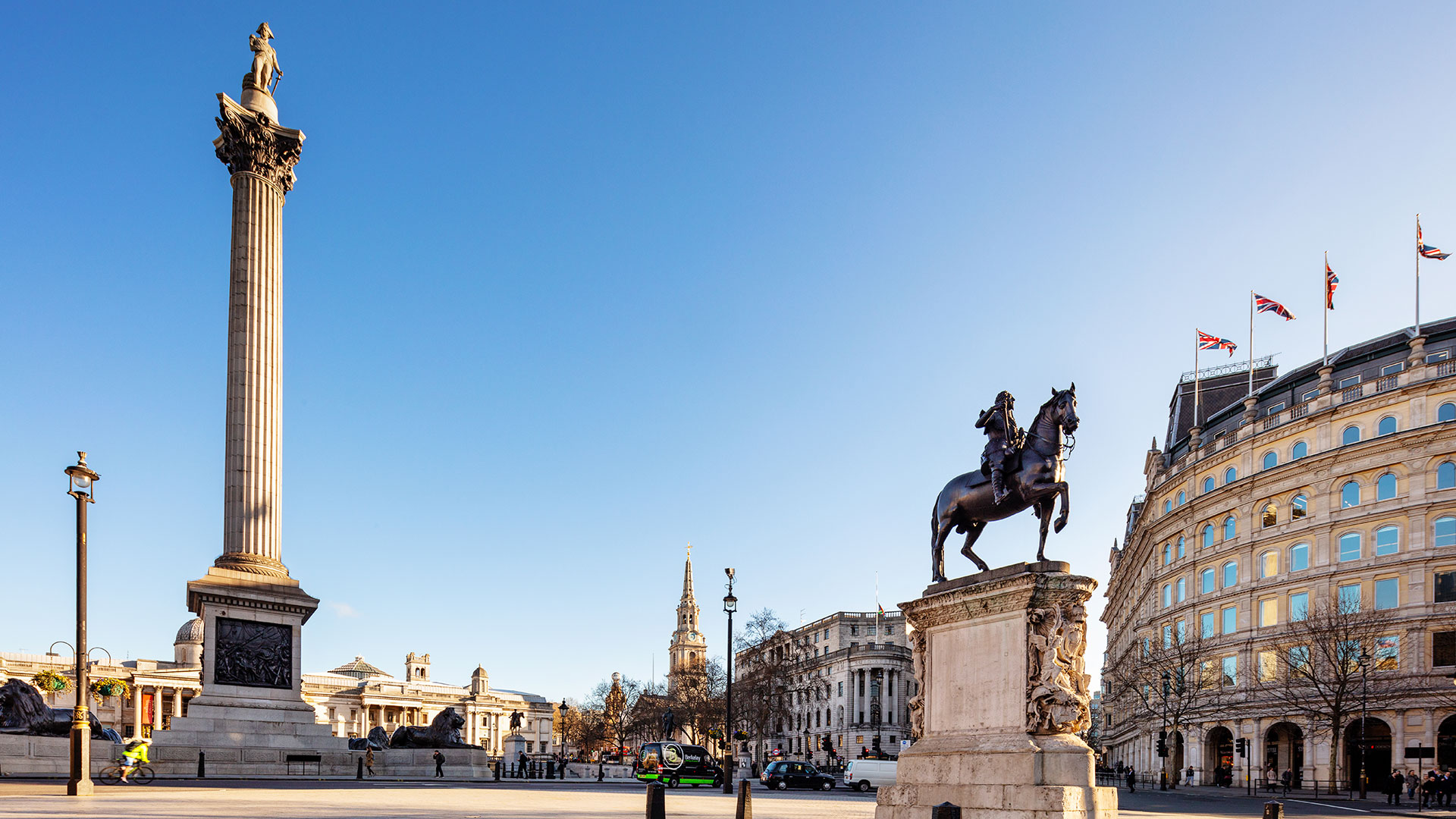 Nelson's Column in Trafalgar Square. Image courtesy of visitlondon.com / Jon Reid. Nelson's Column in Trafalgar Square on a sunny day