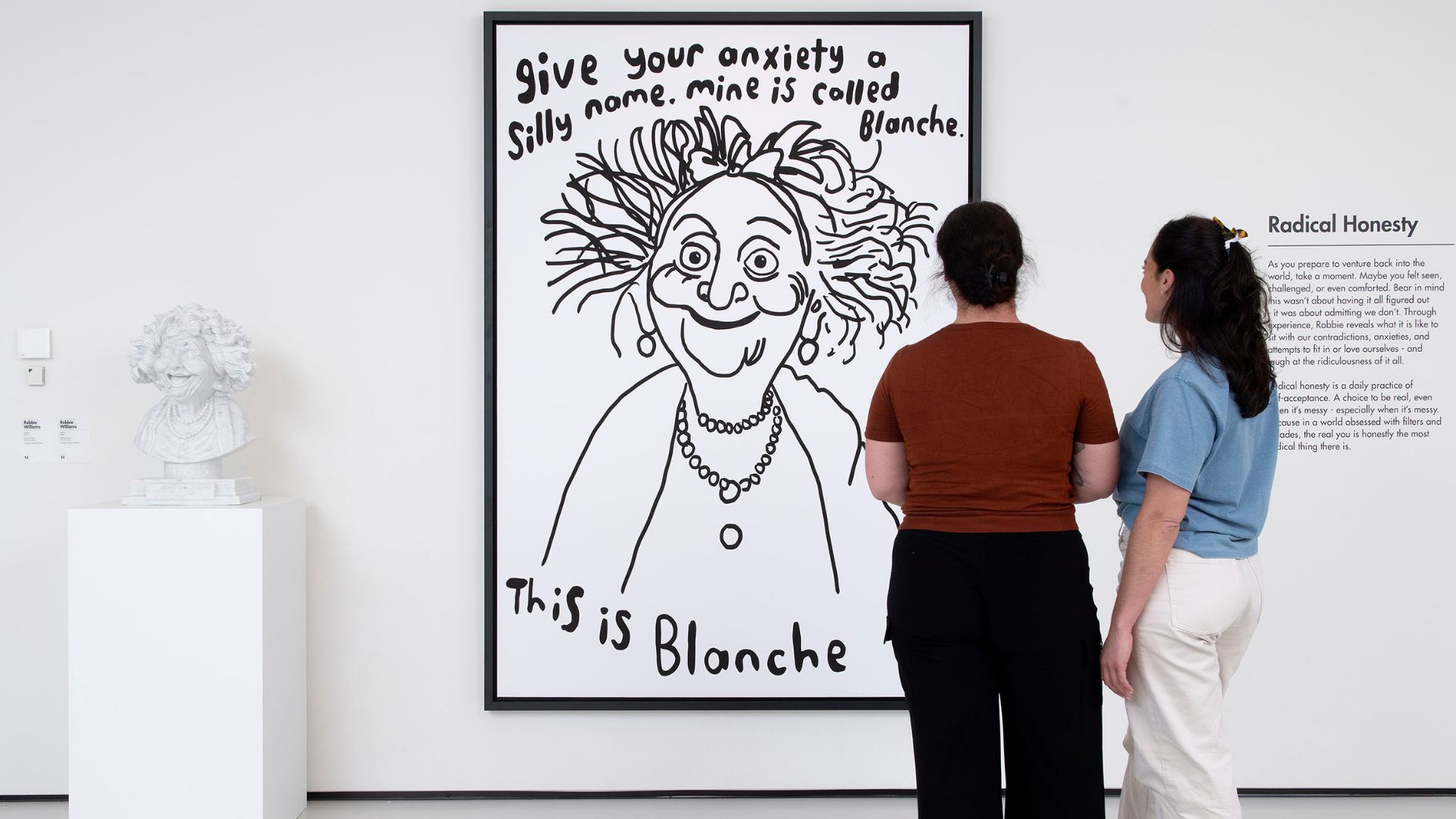 Discover never-before-seen sculptures at Robbie Williams' Radical Honesty exhibition. Image courtesy of Moco Museum. Sculpture and artwork of Robbie Williams' "Blanche" character.