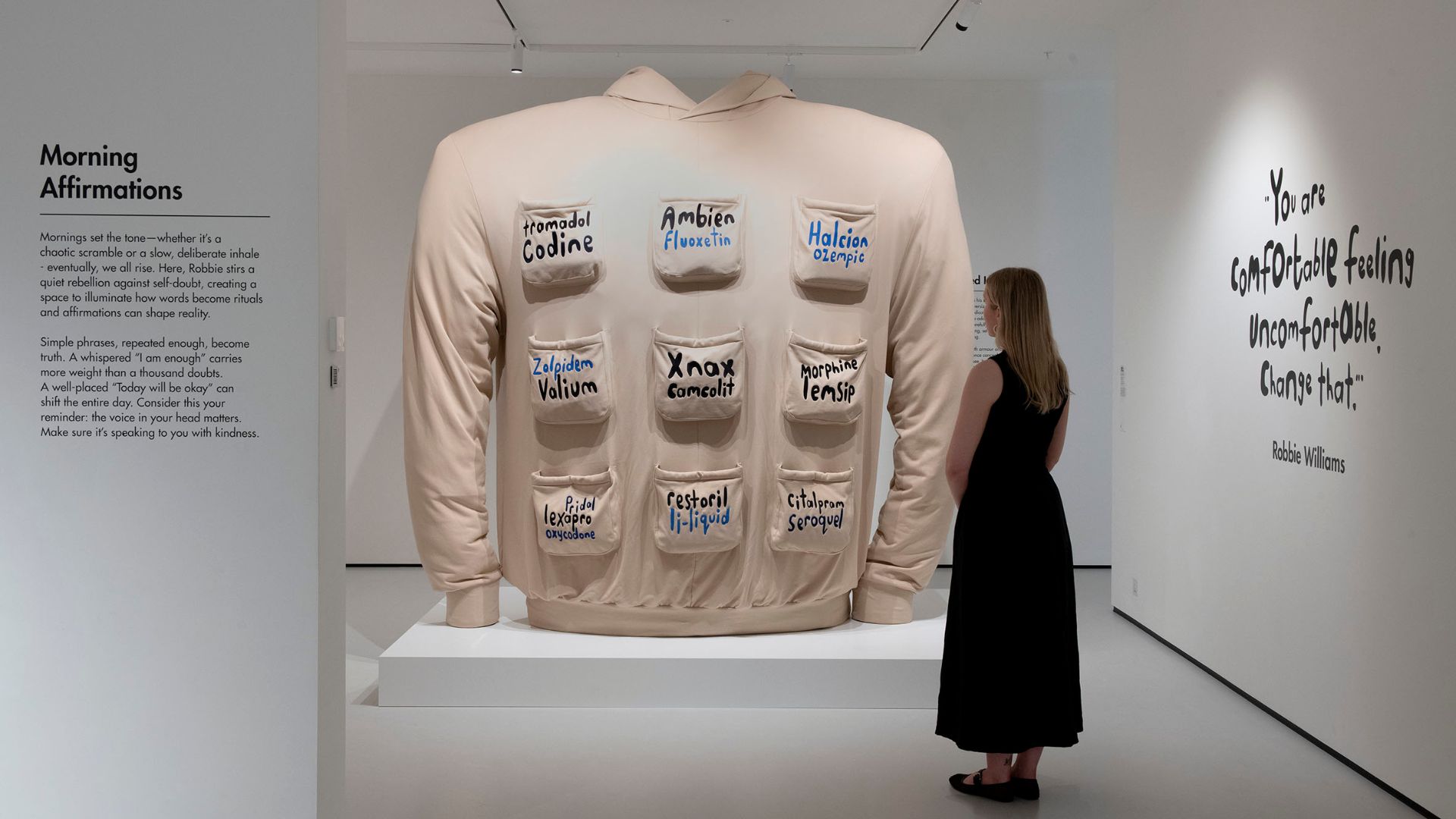 Explore Robbie Williams' self-reflective sculptures, including "Hoodie" at Radical Honesty. Image courtesy of Moco Museum. Giant hoodie installation as part of Robbie Williams Radical Honesty exhibition.