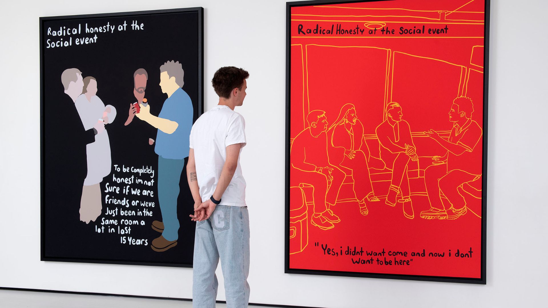 Uncover Robbie Williams' inner thoughts at his new Radical Honesty exhibition. Image courtesy of Moco Museum. Person standing next to Robbie Williams' artwork at Moco Museum.