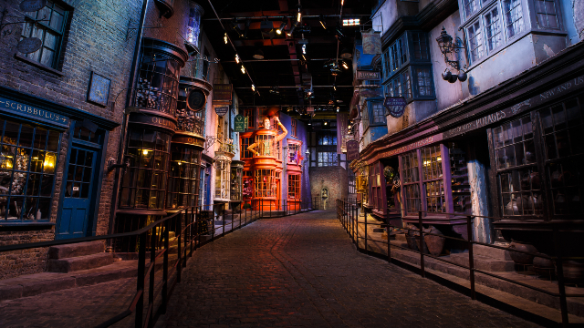 The Diagon Alley set from the Harry Potter film series, set in a nigh time atmosphere.