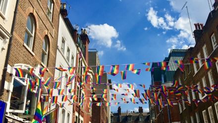 Rainbow flag decorations in Soho. Image courtesy of Shutterstock.