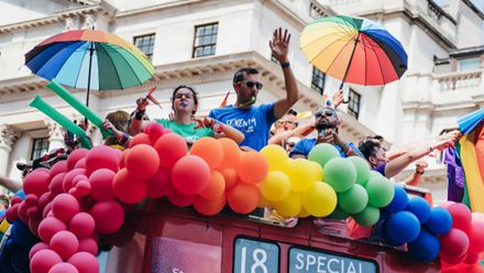 Pride parade on London bus. Image courtesy of Shutterstock.
