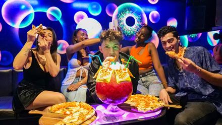 Plan a fun night out at Ballie Ballerson, with a giant ball pit bar, fresh pizza and extravagant cocktails. Image courtesy of Ballie Ballerson.