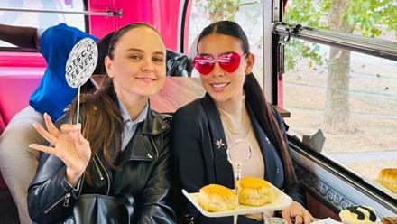 Enjoy a one-of-a-kind afternoon tea experience on board the "Here We Go Again" afternoon tea bus tour of London. Image courtesy of Golden Tours.
