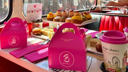 Tuck into sweet treats and savoury delights and spot famous London landmarks onboard Brigit's Bakery afternoon tea bus tour. Image courtesy of Brigit's Bakery.