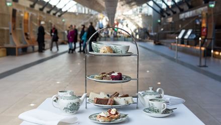 Enjoy a delicious afternoon tea beneath the iconic copper-clad hull of the Cutty Sark. Image courtesy of Red Letter Days.