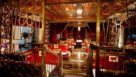 The glamorous red booths at Bob Bob Ricard. Image courtesy of Bob Bob Ricard.