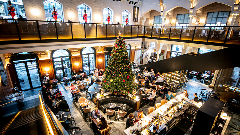 Dine alongside the incredible German Gymnasium Christmas tree. Credit: Thomas Alexander. Image courtesy of Darby & Parrett. An aerial shot of German Gymnasium restaurant and its 20ft Christmas tree