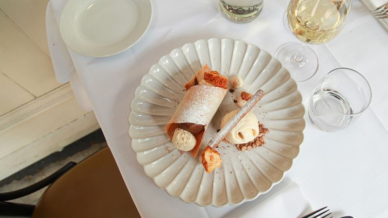 Christmas dessert at Le Vacherin in Chiswick. Credit: Le Vacherin. Image courtesy of Le Vacherin. Lagavulin 12 years whisky and chocolate cremeaux with tuille and chocolate cigar.