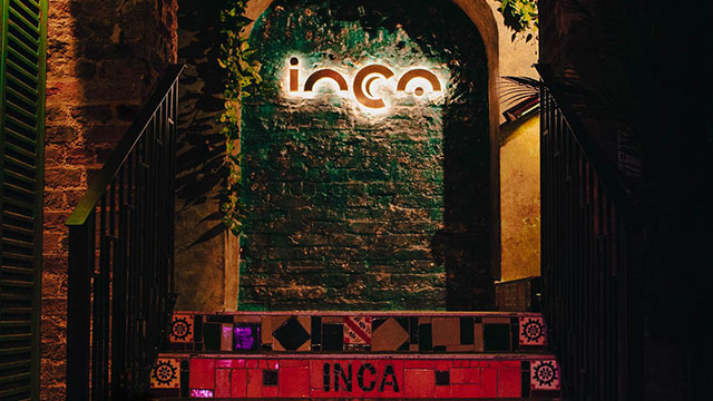 Inca London © T Alexander Photography / Inca London. Image courtesy of T Alexander Photography / Inca London Steps leading up to a leafy arch at Inca restaurant in London