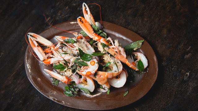 Plate of langoustines, kaffir lime and sweet mint.