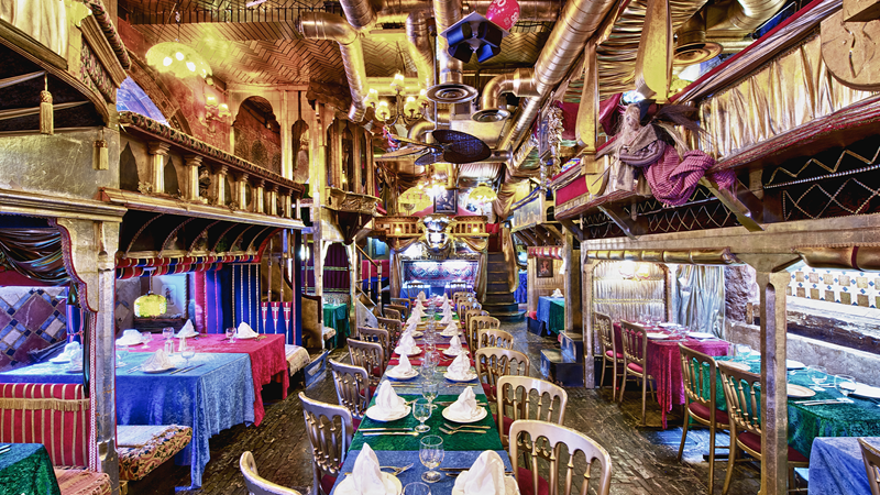 Dine in the theatrical Sarastro Restaurant, inspired by Mozart's A view of the quirky interiors of Sarastro Restarant and its colourful table cloths