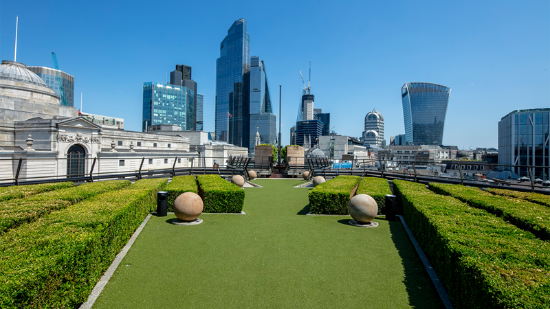 Discover a French-inspired menu and city views at Coq d'Argent rooftop bar. Credit: Coq d'Argent. Image courtesy of Coq d'Argent. View from Coq d'Argent rooftop bar