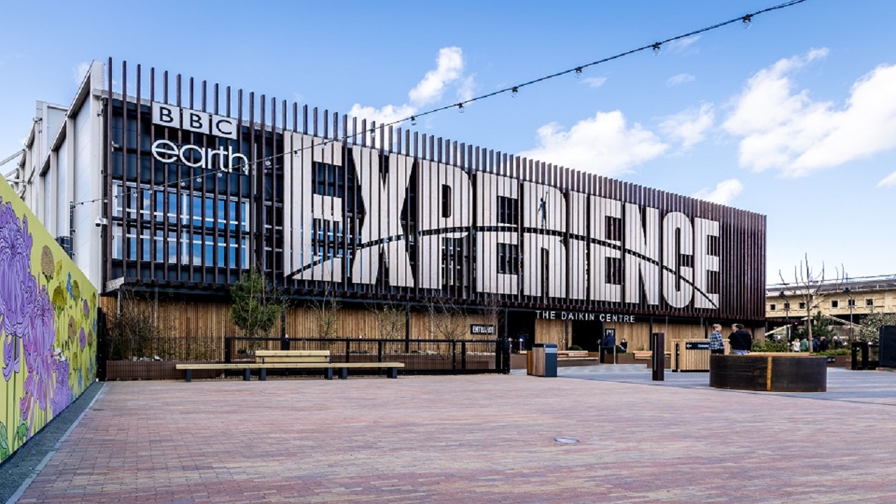 BBC Earth Experience at The Daikin Centre in Earl's Court. Image courtesy of BBC Earth Experience. purpose-built wooden and metal venue for the BBC Earth Experience, with cloudy blue skies in the foreground