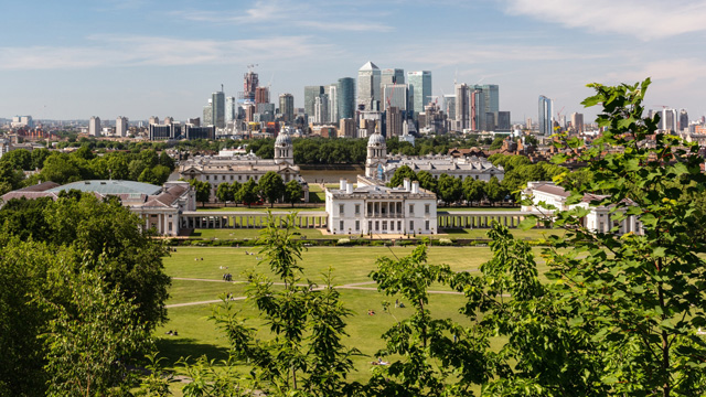 Greenwich Park and views of London's skyline © visitlondon.com / Jon Reid. Image courtesy of visitlondon.com / Jon Reid. Greenwich Park on a sunny day with views of iconic buildings in the London skyline