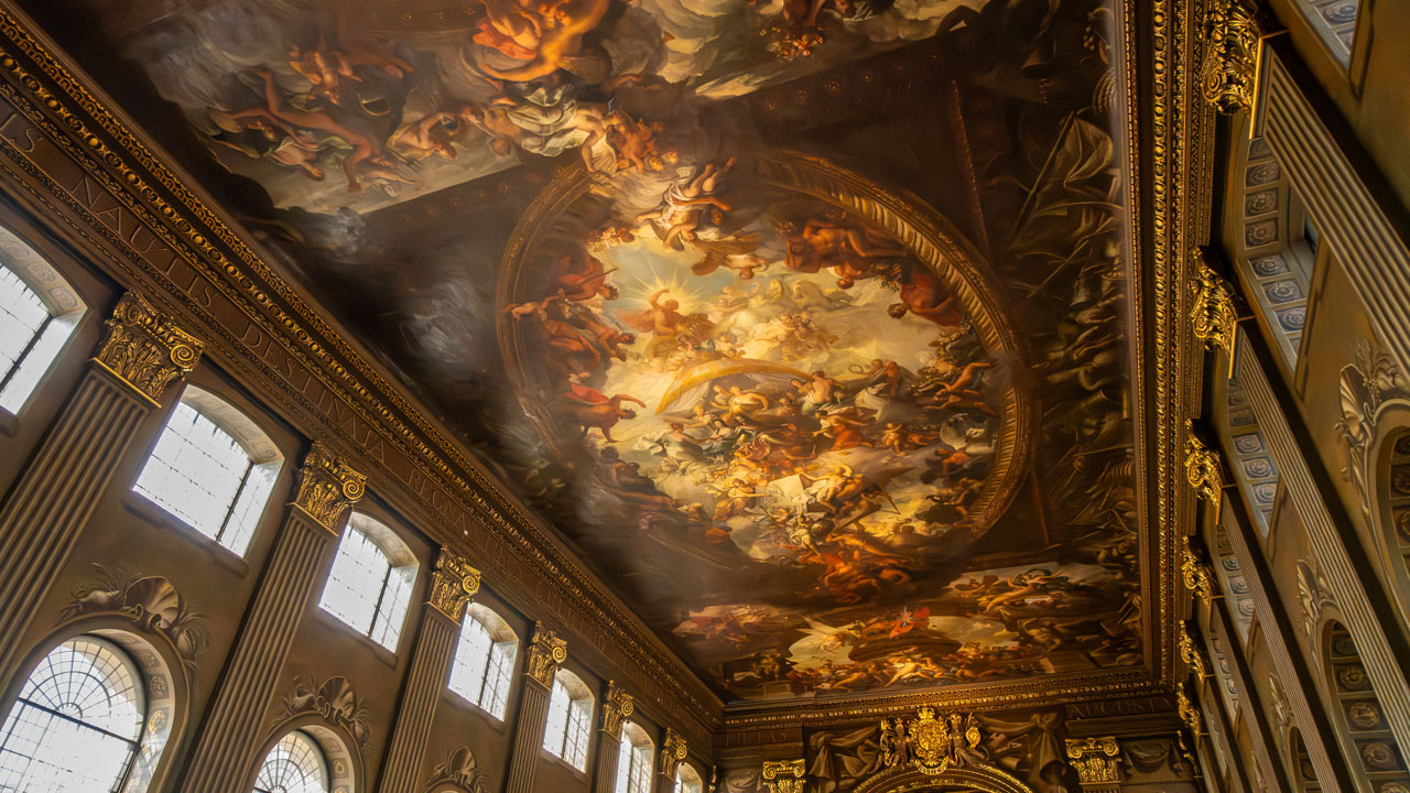 Admire one of Greenwich best kept secrets, The Painted Hall, where many movies have been filmed. © London & Partners/Michael Barrow The Painted Hall, site where many movies were filmed, shows a ceiling where a Renaissance type scene is painted.