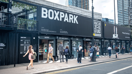 Browse the shops at Boxpark Shoreditch before heading upstairs for food and drinks. Credit: Shutterstock. Image courtesy of Shutterstock.