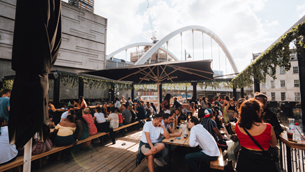 Gather with friends in the open-air Boxpark in Shoreditch. Credit: Grant Walker. Image courtesy of Boxpark.