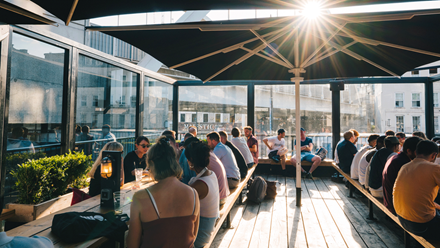 Gather with friends in the open-air Boxpark in Shoreditch. Credit: Grant Walker. Image courtesy of Boxpark.