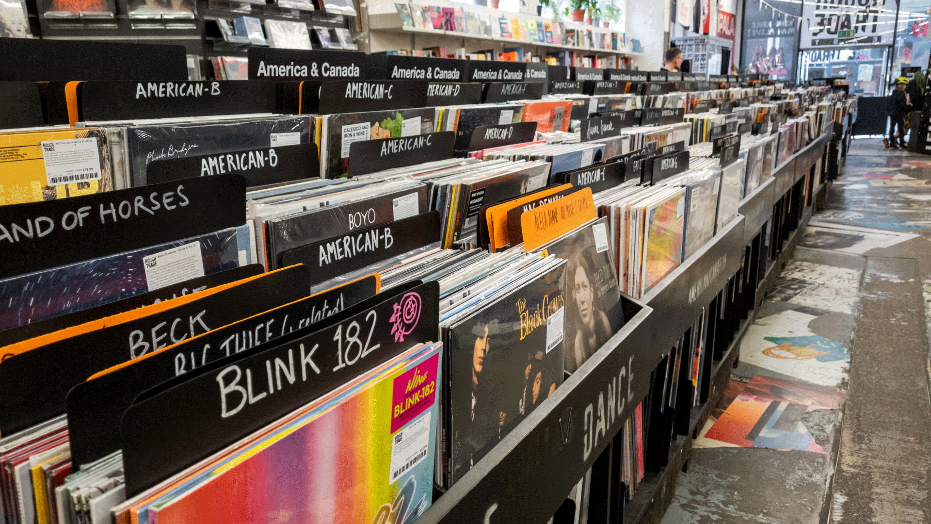 Hunt for records at Rough Trade East in Shoreditch. Image courtesy of Shutterstock. Photo of different records categorised alphabetically in record store with "Blink 182" in the foreground