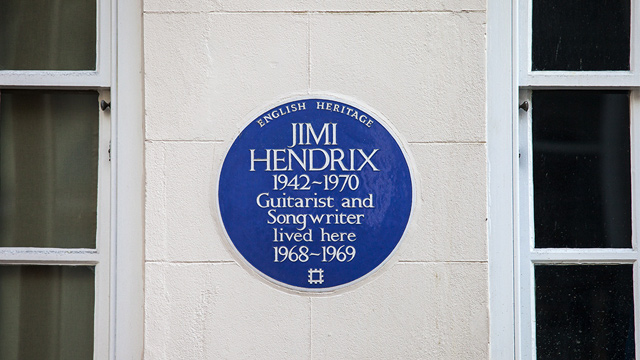 Spot the blue plaque of legendary guitarist Jimi Hendrix on Brook Street. Image courtesy of Shutterstock. Blue plaque on white wall on Brook Street in London's Mayfair, stating that guitarist and songwriter Jimi Hendrix lived here from 1968 to 1969.