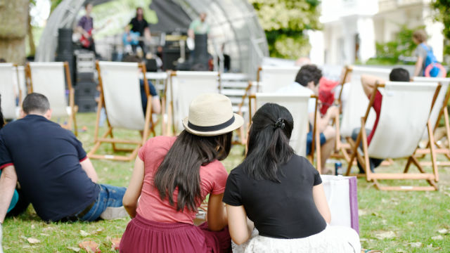 girls sitting in Norfolk Square gardens