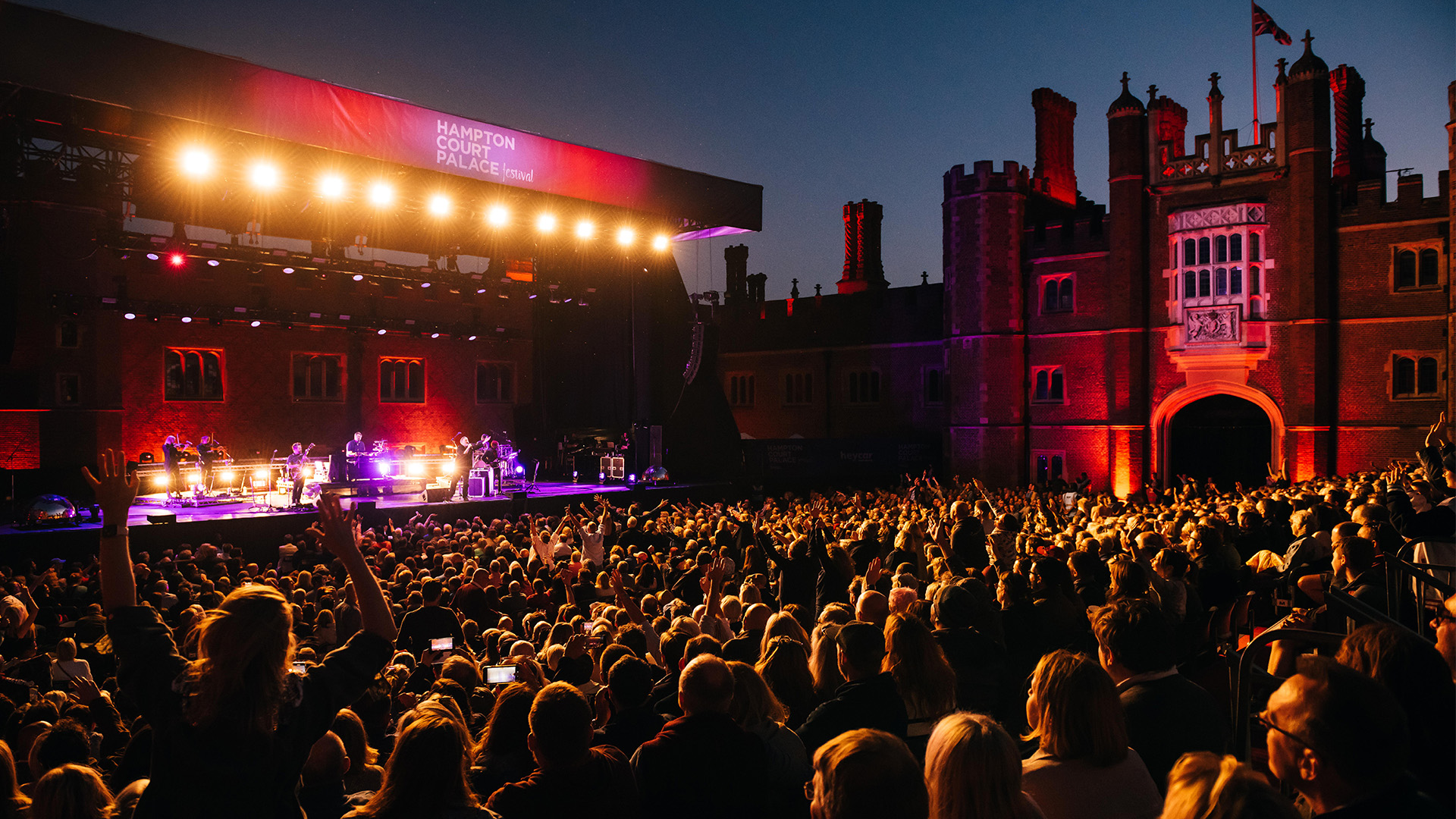 Crowds dance to Elbow at Hampton Court Palace Festival. Image courtesy of Hampton Court/Josh Atkins. Crowds dance to Elbow at Hampton Court Palace Festival