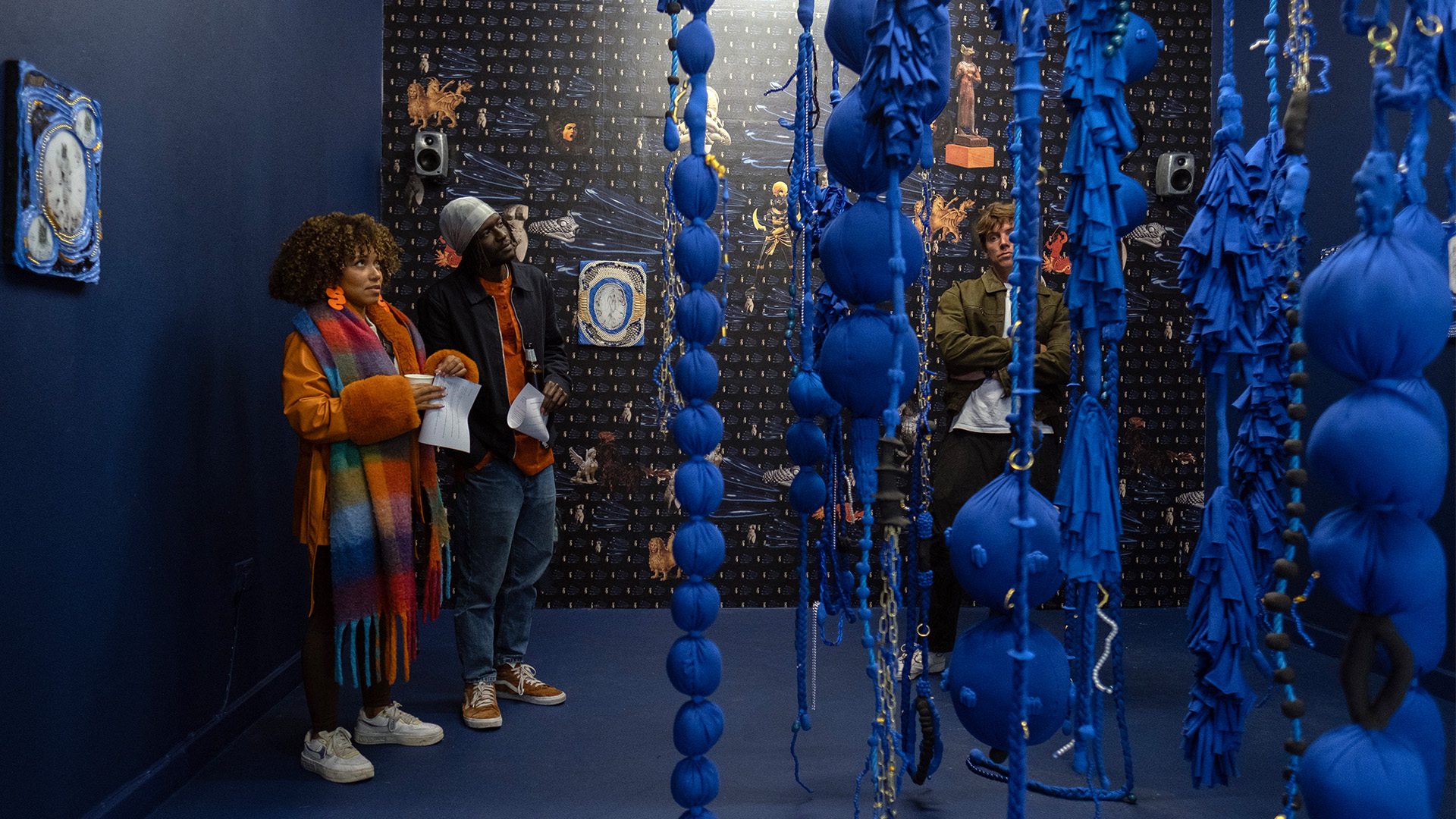 Discover London's top art spaces at London Gallery Weekend. Image courtesy of London Open Gallery Weekend/Linda Nylind. A couple looking at a fabric artwork at London Open Gallery Weekend.