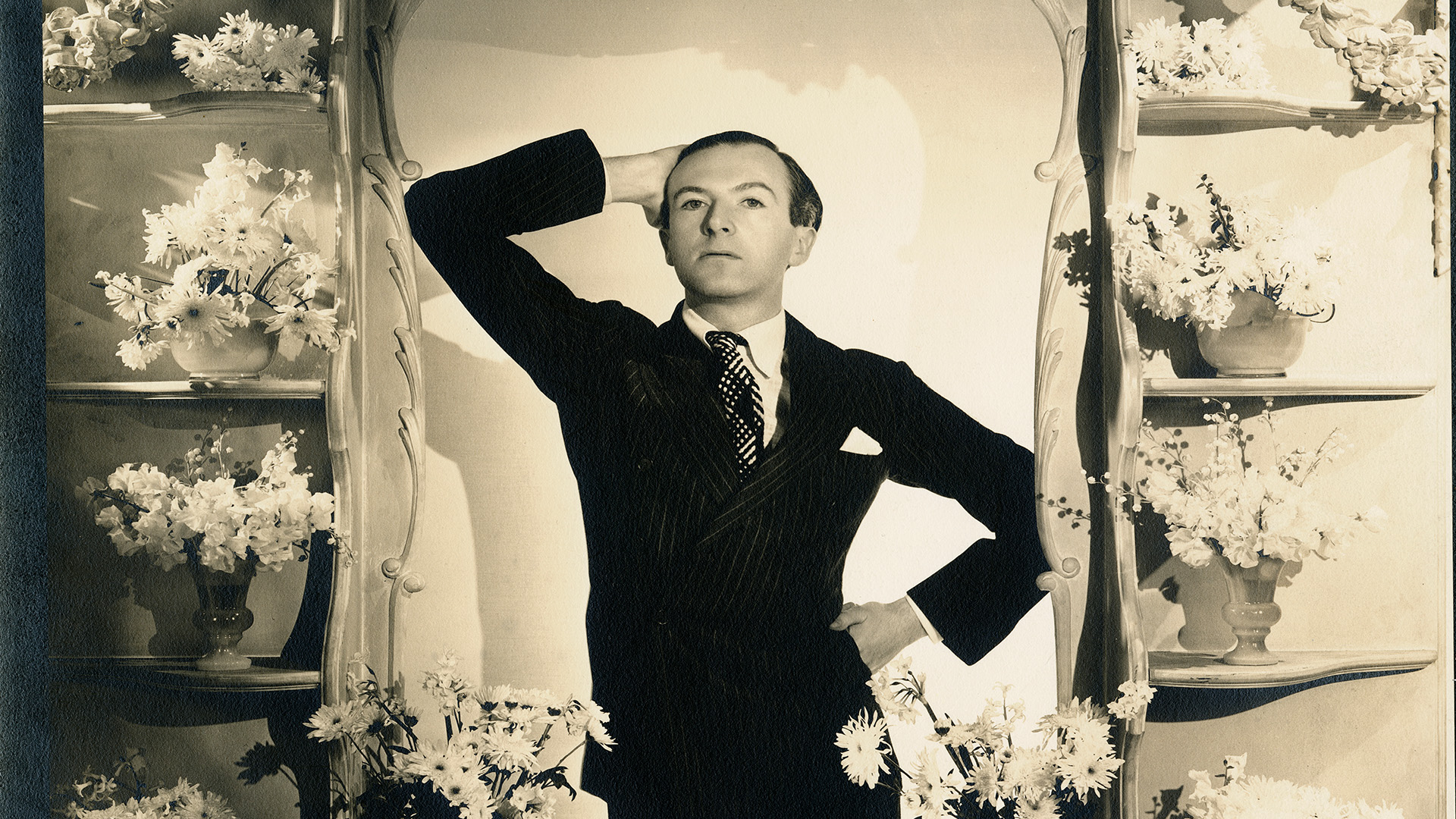 Cecil Beaton, c.1935, Gelatin silver print, The Cecil Beaton Studio Archive, London. Image courtesy of National Portrait Gallery. A self-portrait of Cecil Beaton