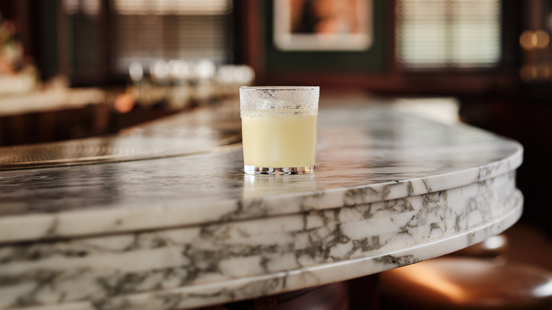 Explore the best of London's bar scene at London Cocktail Week. Image courtesy of Charlie McKay. A zesty cocktail at London Cocktail Week