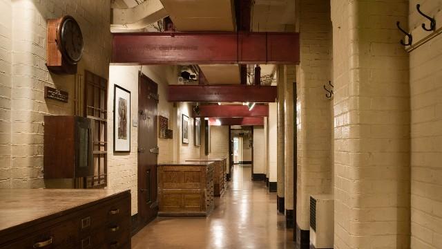 A corridor at the Churchill War Rooms. Image courtesy of IWM. Photo credit: Richard Ash. The corridor of the churchill war rooms.