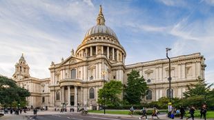 landscape photo of st paul's cathedral, with a cloudy blue sky in the background