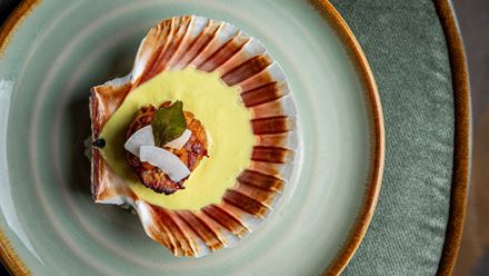 Food in a scallop shell. Image courtesy of Shangri-La The Shard, London.