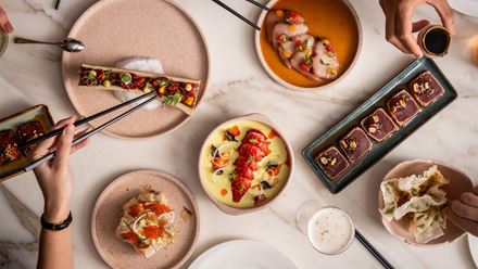 A selection of dishes on a white marble table. Image courtesy of Shangri-La The Shard, London.