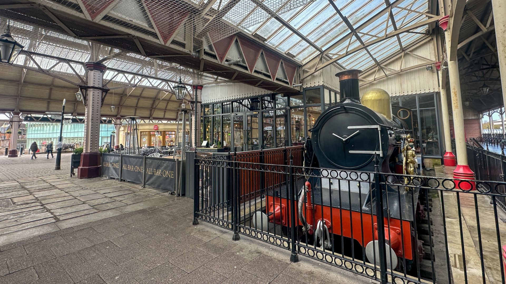 See the old locomotive at Windsor train station. © Visit London/Kirstine Spicer An old red and black locomotive at Windsor train station.