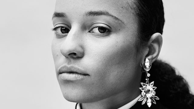 Grace Wales Bonner. Image courtesy of Jamie Morgan/DLX. A close-up black-and-white image of Grace Wales Bonner, looking into the camera.