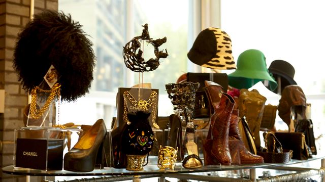 Vintage accessories at Rellik. Image courtesy of Rellik. Vintage boots, hats and accessories of various retro styles on display.