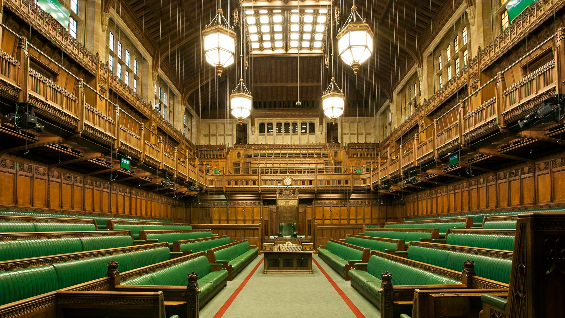 Visit the House of Commons chamber, where members of parliament gather weekly to debate key issues. Image courtesy of UK Parliament. The iconic chamber in the Houses of Parliament, including green leather seating and chandeliers.