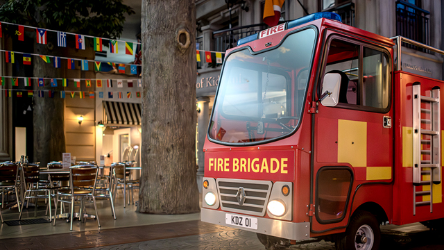 Visit KidZania in London and let the kids experiment with real life situations. © visitlondon.com/Michael Barrow The fire brigade truck parked on the side of a street inside KidZania, a London attraction.
