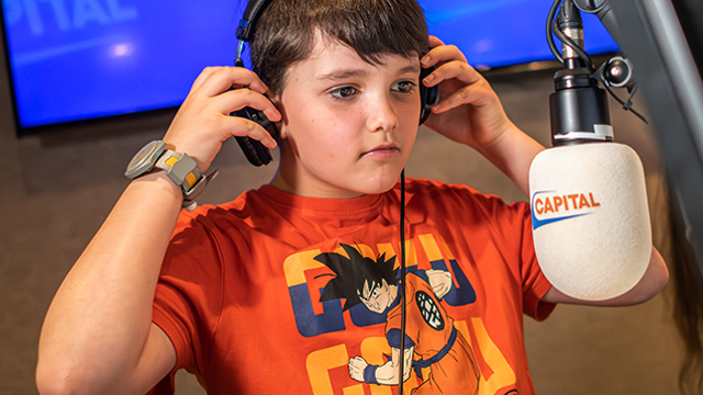 Visit KidZania with the kids and discover a city where they can try different professions. Image courtesy of © visitlondon.com/Michael Barrow A boy in the KidZania radio studios in London, trying his hand at being a radio presenter.