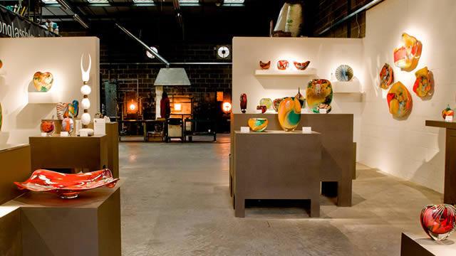 Colourful pieces of blown glass on the walls and on display stands at London Glassblowing.